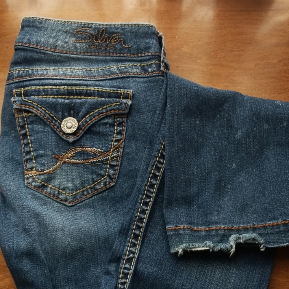 Silver bootcut jeans. 27x33